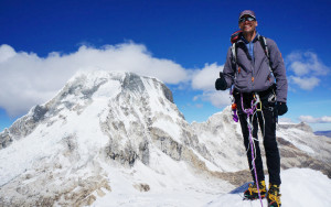 Carl Schmitt at the 18,000 foot summit of Ishinca mountain in the Cordillera Blanca.