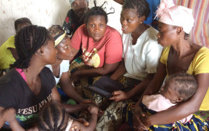 Indigenous women in Penzele, Democratic Republic of the Congo, reflecting on how to use hi-tech GPS systems to map their lands. 
