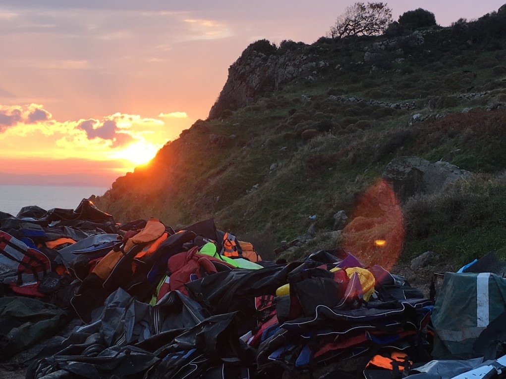 Cut up life jackets and rubber dinghies litter the beaches of Lesvos.