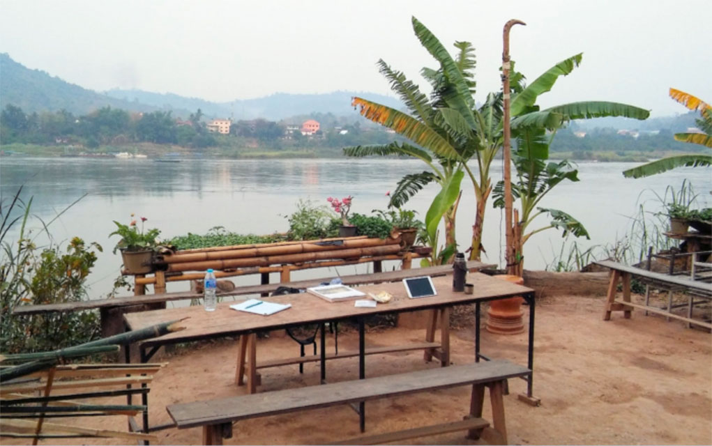  This is Mr. Niwat’s desk — and also serves as the Mekong School’s lunch table — on the banks of the river. Niwat sees the main threats to the river as dams, destruction of rocks and rapids, agricultural chemicals, garbage thrown into the river from ships, development in wetlands and illegal fishing techniques like blasting and electro-shock. 