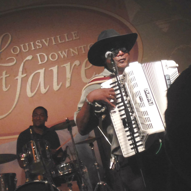 Nathan & the Zydeco Cha Cha’s perform at the Louisville downtown Street Faire