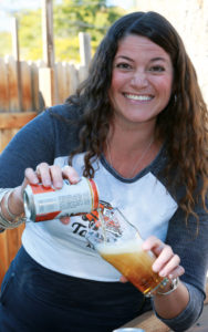 The Post Brewing Company’s Assistant General Manager Sarah Ingraham enjoying the outdoor patio. 