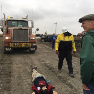 Ed Fallon and other activists block construction vehicles on Coppola’s land on Oct. 15, 2016. Both Coppola and Fallon were later arrested. 