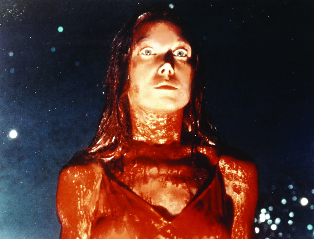 Sissy Spacek covered in blood at the prom in the 1976 film adaptation of Carrie by Brian De Palma by MGM