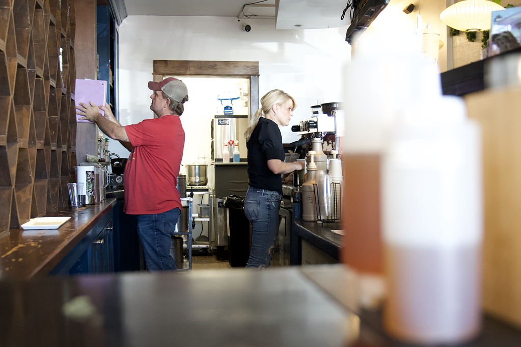 man and woman work in brightly lit coffee and tea shop Jeff Rommel and Alisha Mason Pekoe Sip House Boulder Colorado 2024