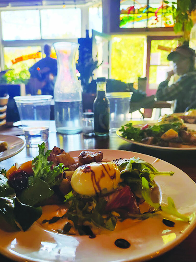 brunch plate restaurant eggs on table with water carafe sunny window at Jamestown Mercantile in Colorado