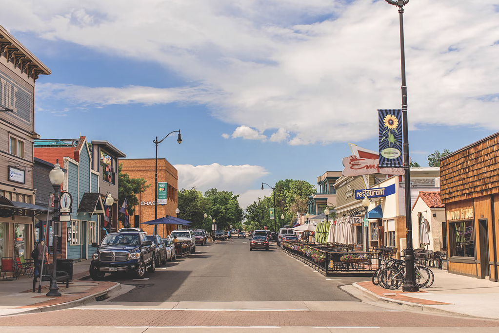 downtown Louisville Colorado road and building with blue sky